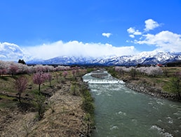 Overlook the Myoko mountain range from the bridge over the Yashiro River