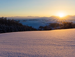 Rays of the rising sun, Tokachidake mountain range